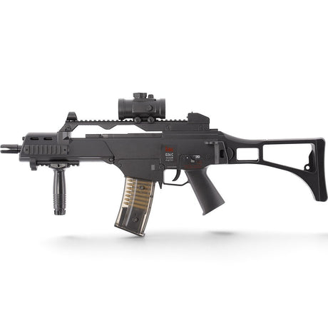 id-paintball Heckler & Koch G36C Airsoft AEG mit Leuchtpunktvisier, Schalldämpferattrappe und klappbarem Schaft.