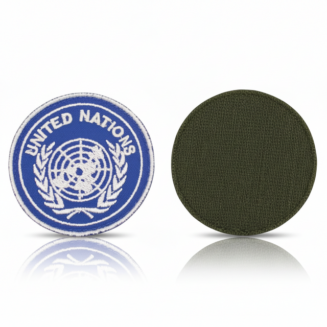 id-paintball Klettabzeichen United Nations in Blau mit weißem Logo und Klettfläche auf der Rückseite